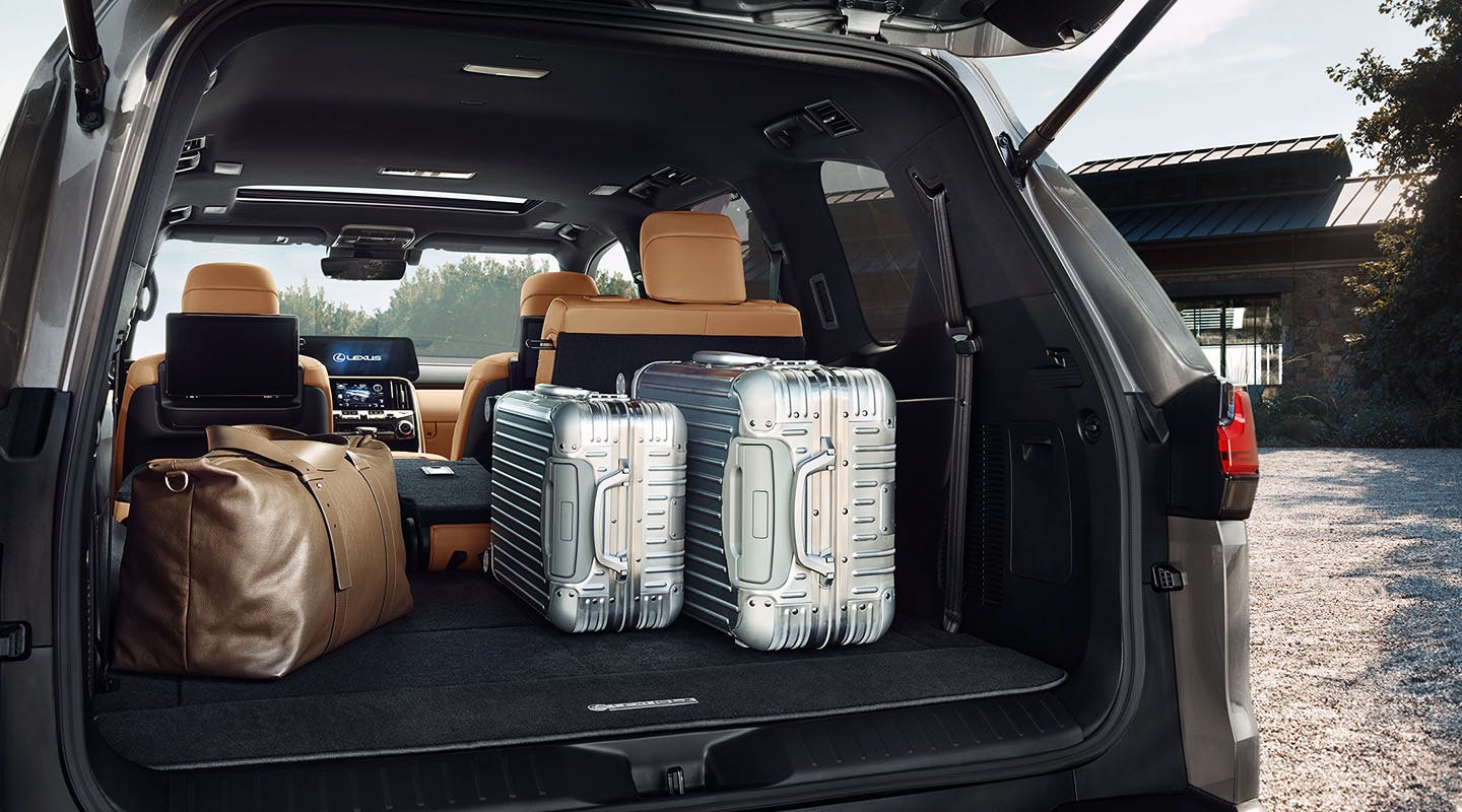 Detail shot of the open trunk of the 2022 Lexus LX 600 with luggage. | Prestige Lexus in Ramsey NJ